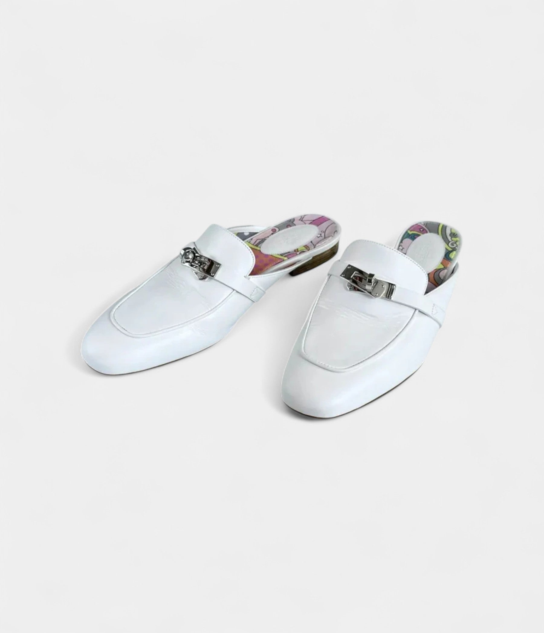 Hermès Oz Leather Mules & Clogs Iconic Elegance with a Contemporary Edge