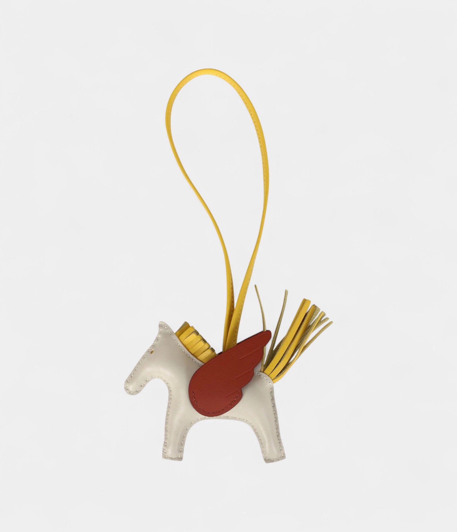 Hermès Pegase Rodeo Bag Charm PM Craie Jaune De Naples Cuivre Milo Lambskin