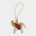 Hermès Pegase Rodeo Bag Charm PM Craie Jaune De Naples Cuivre Milo Lambskin