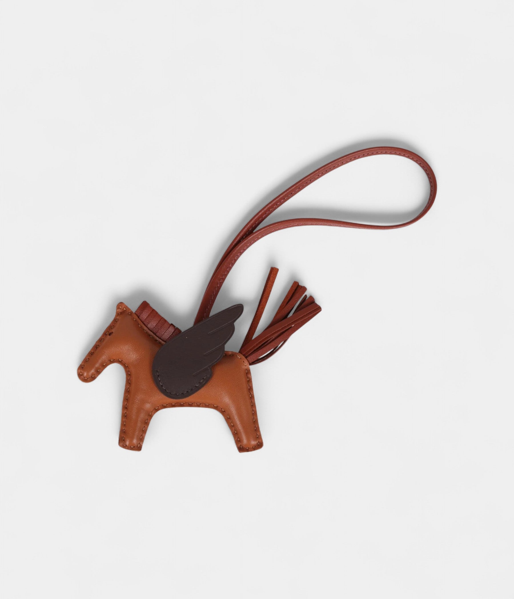 HermesPegaseRodeoBagCharmPMPainD_EpiceSienneMokaSwift_MiloLambskin_2_19b2e354-cd1b-41f9-b23f-6f9d5c2dff5a.jpg Hermès Pegase Rodeo Bag Charm PM Pain D'Epice Sienne Moka Swift & Milo Lambskin