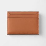 Must de Cartier Double Card Holder in Caramel Embossed Calfskin Refined Utility with Iconic Flair