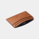 Must de Cartier Double Card Holder in Caramel Embossed Calfskin Refined Utility with Iconic Flair