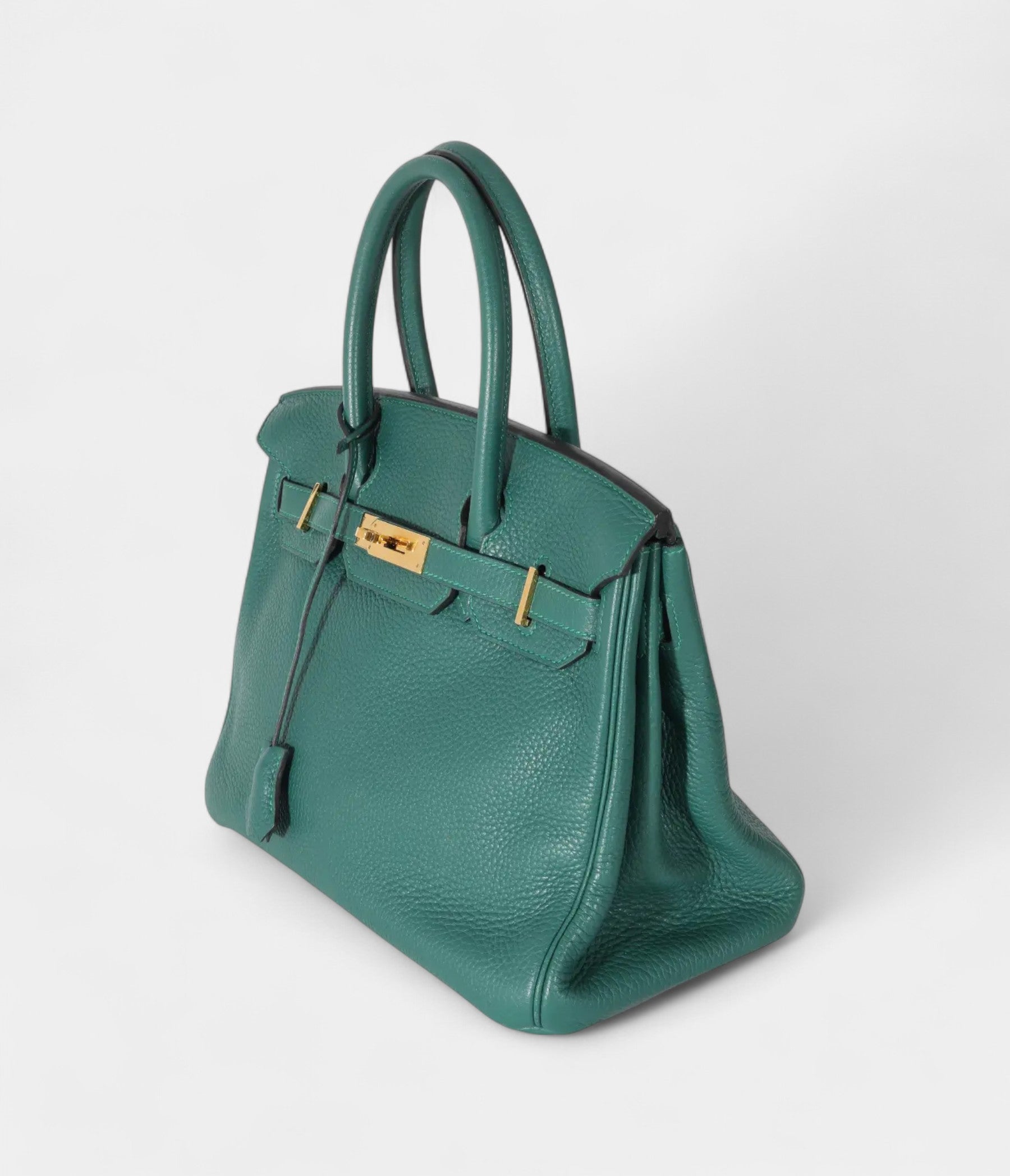TheHermesBirkin30GreenLeatherHandbagisatimelesssymbolofluxury_3.jpg The Hermès Birkin 30 Green Leather Handbag is a timeless symbol of luxury