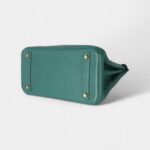 The Hermès Birkin 30 Green Leather Handbag is a timeless symbol of luxury