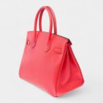 The Hermès Birkin 30 leather handbag stands as a symbol Elegance