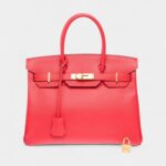 The Hermès Birkin 30 leather handbag stands as a symbol Elegance
