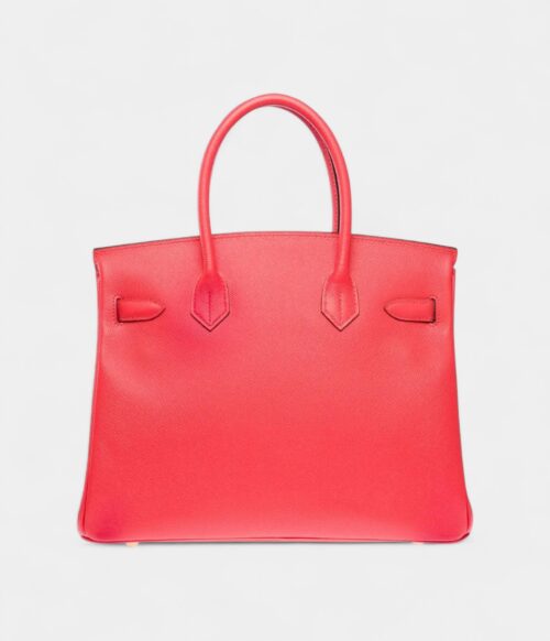 The Hermès Birkin 30 leather handbag stands as a symbol Elegance