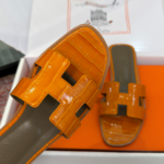 Hermès Oran Sandals for Women In Summer Quick Dry Leather with orange