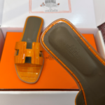 Hermès Oran Sandals for Women In Summer Quick Dry Leather with orange
