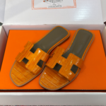 Hermès Oran Sandals for Women In Summer Quick Dry Leather with orange