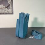 The Hermès Evelyne 23cm in denim blue