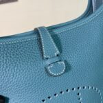 The Hermès Evelyne 23cm in denim blue