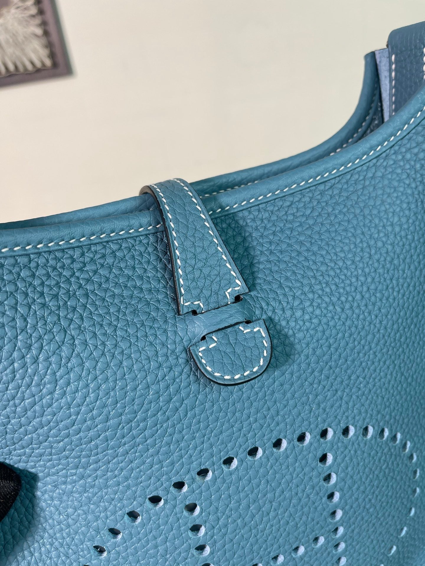 The Hermès Evelyne 23cm in denim blue