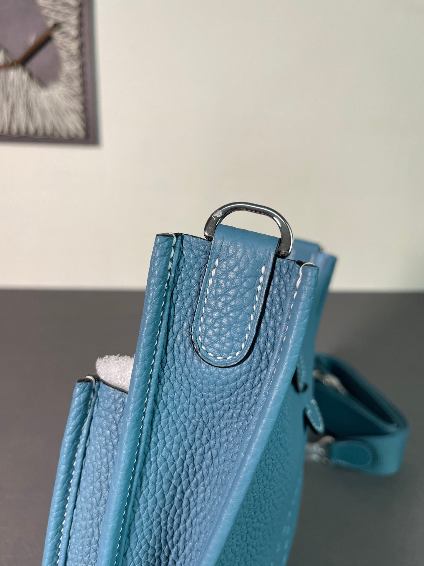 The Hermès Evelyne 23cm in denim blue